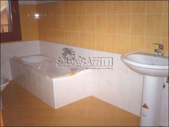 Villa a schiera con garage e giardino