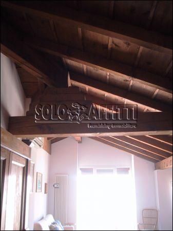 Mansarda arredata Bologna