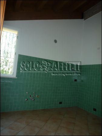 Appartamento con posto auto e giardino