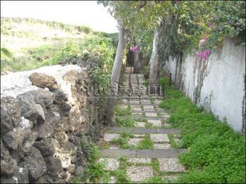 Appartamento con giardino e balcone
