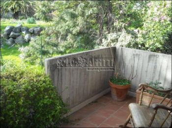 Appartamento con giardino e balcone