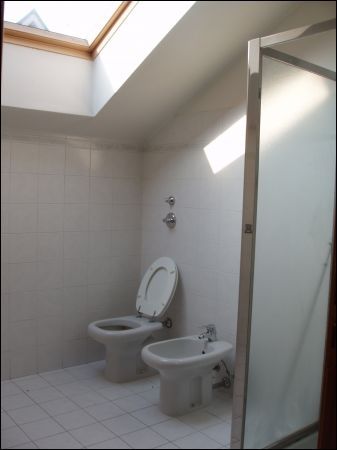 Mansarda con balcone Centro