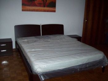 Appartamento con terrazzo e posto auto