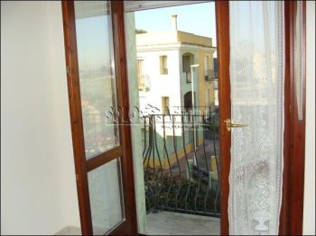 Appartamento con posto auto e balcone