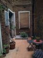 Appartamento con giardino e garage Centro