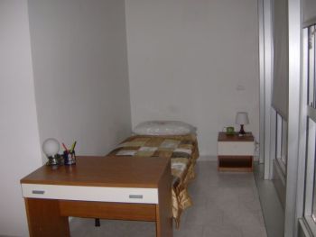 Ampio monolocale zona stazione - Camera da letto