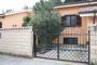 Villa a schiera con terrazzo e giardino