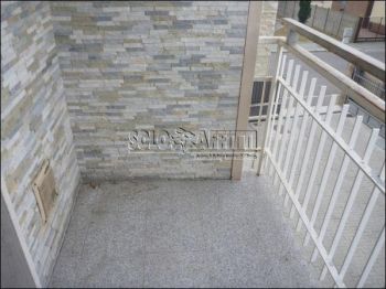 Appartamento con balcone e posto auto