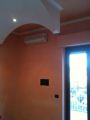 Attico con aria condizionata e balcone