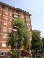 Casa con balcone Opera