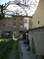 Villa a schiera con giardino e posto auto